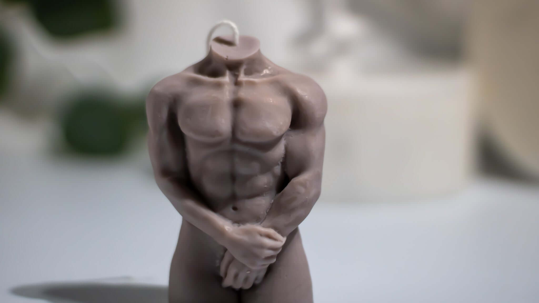 Handmade soy wax candle in male form – clean-burning and non-toxic