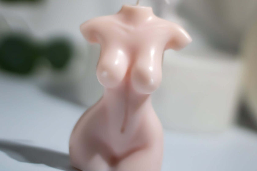 Nude body candle made of sculptural soy wax, elegant feminine form, handcrafted for home decor.
