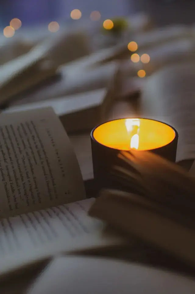 Eco-friendly natural wax candles burning with a warm glow, offering cleaner air and sustainable elegance.
