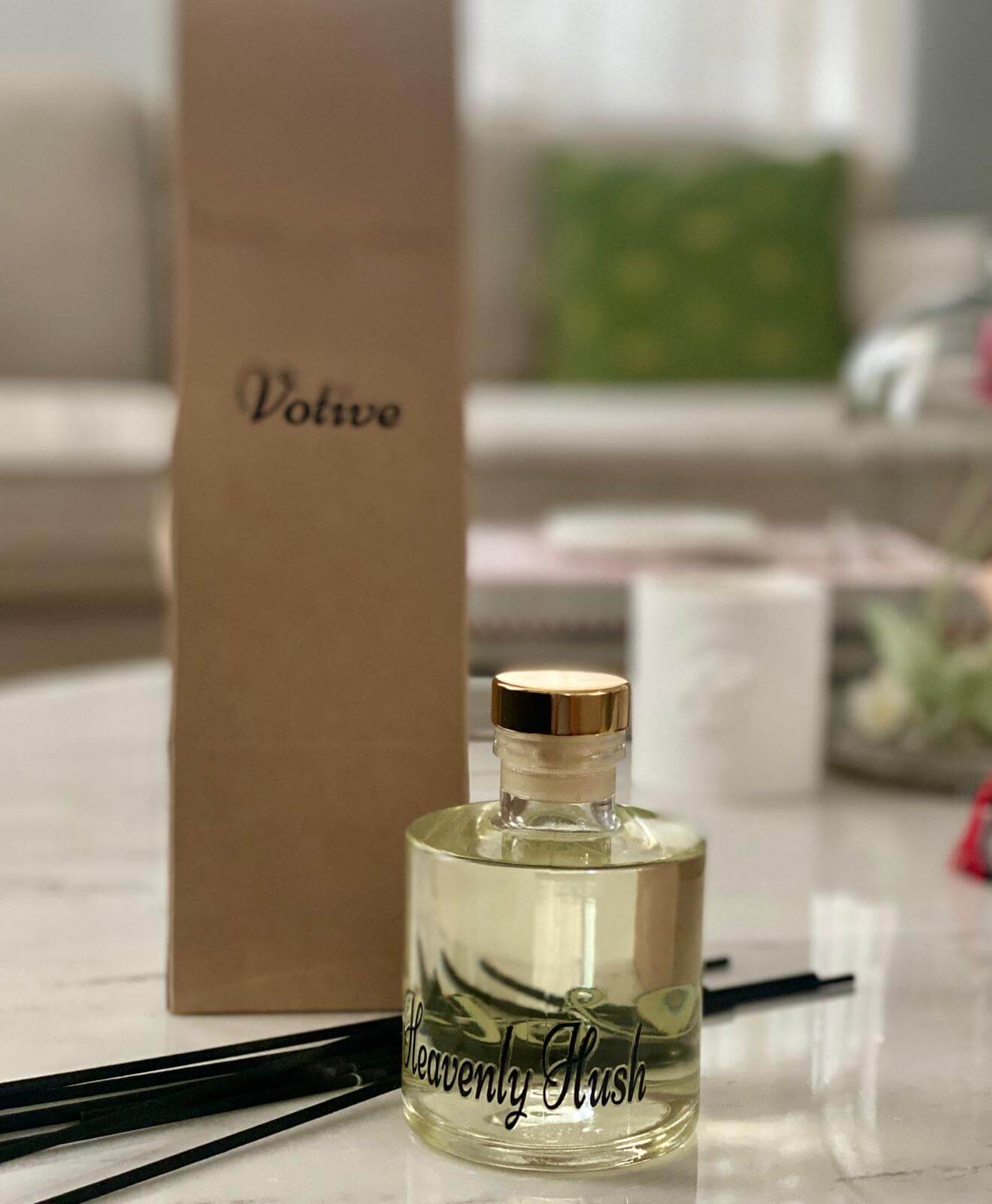 Raindrop Reverie diffuser in a bathroom setting, styled with towels and natural light