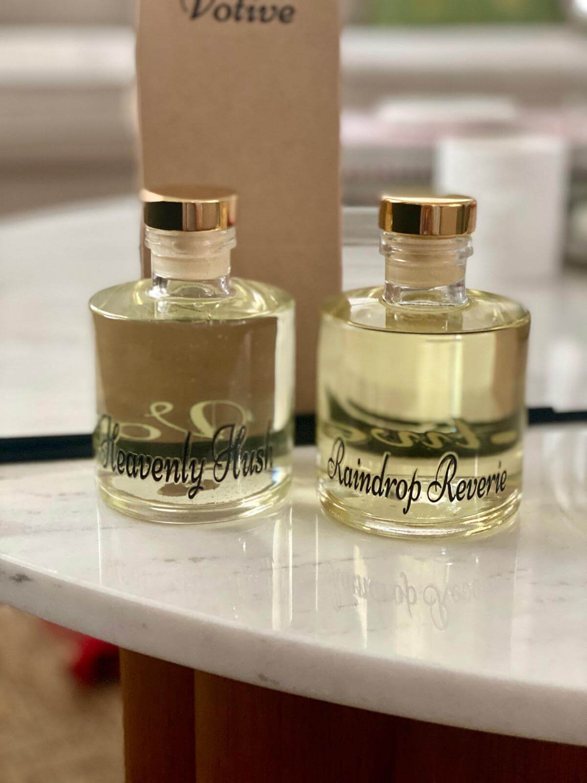 Close-up of Heavenly Hush label showing leather, labdanum, and mandarin fragrance notes