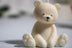 Adorable handmade teddy bear candle crafted from eco friendly soy wax, featuring a creamy white finish and soft details—ideal for nursery décor, baby showers, or sentimental gifting.