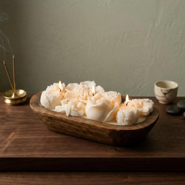 Botanical dough bowl candle with handmade soy wax flowers in a wooden bowl