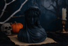 Black Halloween soy wax candle shaped as a gothic veiled woman sculpture, perfect spooky season décor