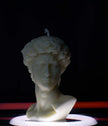 Elevate your home ambiance with the David Head Sculptural Candle — a timeless blend of fine art and sustainability. Hand-poured using non-GMO soy wax, this eco friendly sculptural candle is meticulously hand finished to deliver not just beauty, but ethical luxury. Inspired by classical European design, it transforms any space into a refined sanctuary.

Perfect as a natural soy wax candle for home decor lovers or thoughtful gift givers, this piece stands out for its elegance and clean-burning integrity. Free