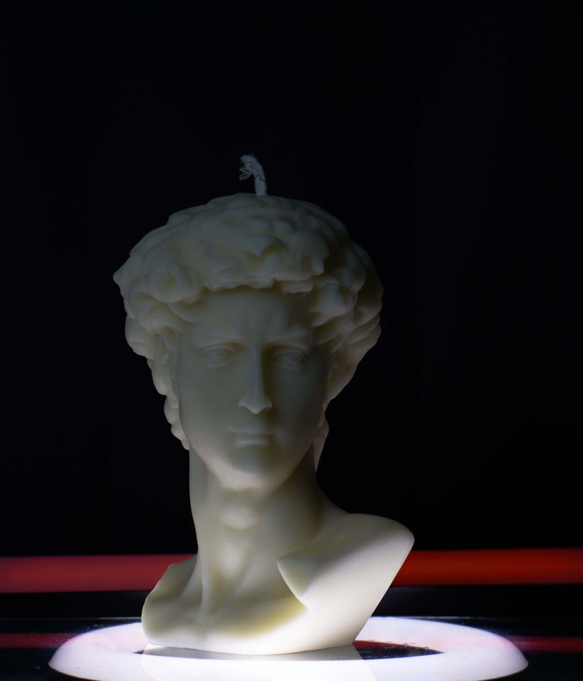 Elevate your home ambiance with the David Head Sculptural Candle — a timeless blend of fine art and sustainability. Hand-poured using non-GMO soy wax, this eco friendly sculptural candle is meticulously hand finished to deliver not just beauty, but ethical luxury. Inspired by classical European design, it transforms any space into a refined sanctuary.

Perfect as a natural soy wax candle for home decor lovers or thoughtful gift givers, this piece stands out for its elegance and clean-burning integrity. Free