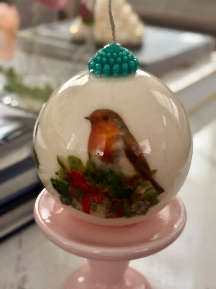 Eco-friendly Christmas ornament candle made from non-GMO soy wax, styled for holiday decor.