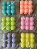 Eco-friendly bubble candle – pastel soy wax cube with soft fragrance for stylish interiors.