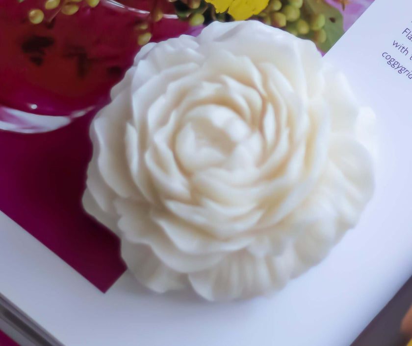 Rose Blossom Candle featuring a sculptural handmade soy wax flower, delicately crafted in a natural design.