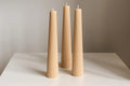 Tall Ribbed Soy Pillar Sculptural Candle soy wax candle — scale view