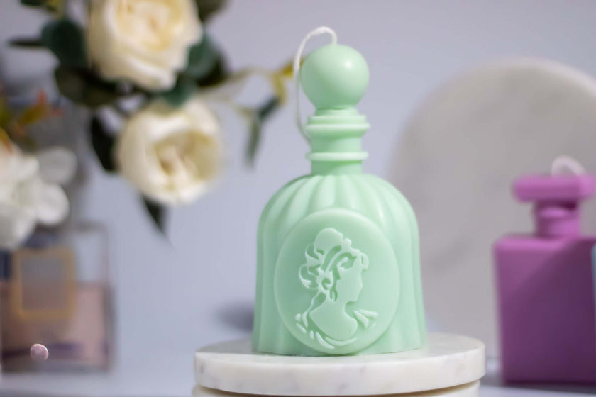 Elegant soy wax candle shaped like perfume bottle – clean-burning and handmade.