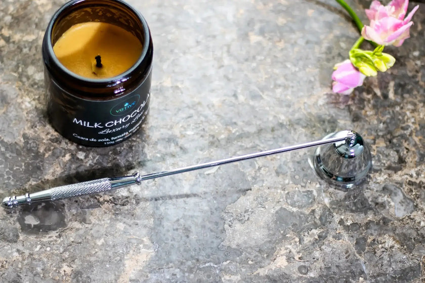 Elegant stainless steel candle snuffer – durable and stylish home accessory.