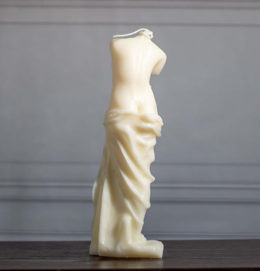 Elegant sculptural soy wax candle inspired by the Venus goddess, showcasing beauty and grace in a timeless design.
