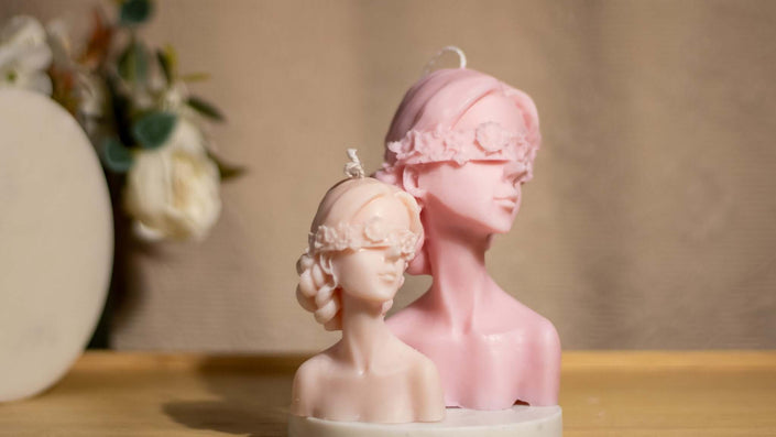 Small Blindfolded Lady Candle soy wax candle — lit candle