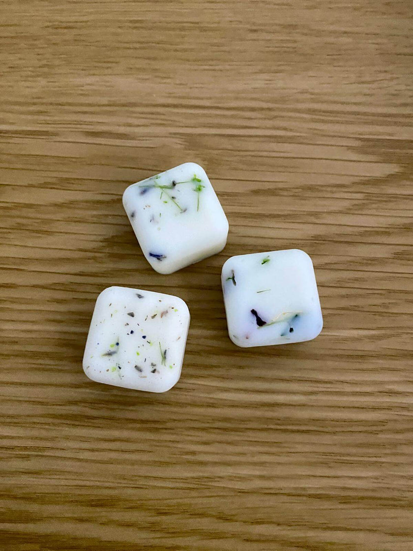 Hand-poured aromatherapy soy wax melts in eco-friendly packaging for luxury home fragrance