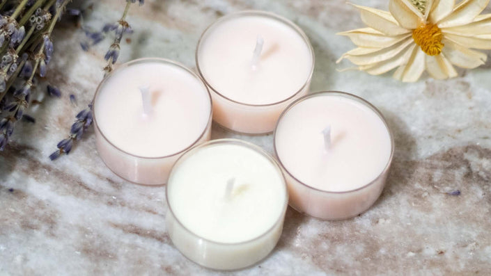 Hand-poured soy wax tealights providing a clean burn.