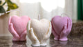 Heart Shaped Candle: Hands Holding Heart – detail view