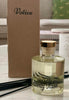 Heavenly Hush reed diffuser displayed on a wooden tray with leather accessories and modern decor

