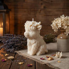 Highland Cow candle displayed on a farmhouse-style shelf