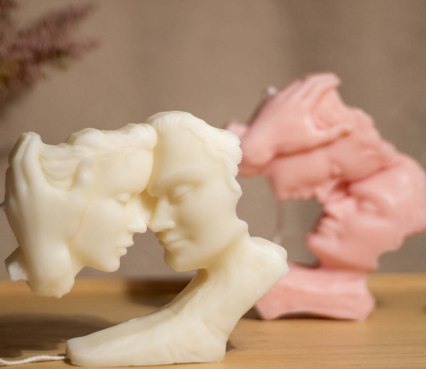 Lovers embrace candle in white soy wax – sculptural romantic decor piece handmade for elegant interiors.
