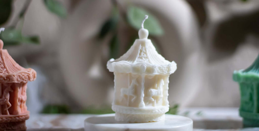 Vintage-inspired candle carousel with a delicate rotating mechanism, perfect for holiday home décor and gifting.