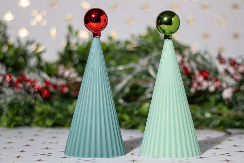 Handcrafted Christmas tree decorative candles in green and blue, perfect for holiday gifting.