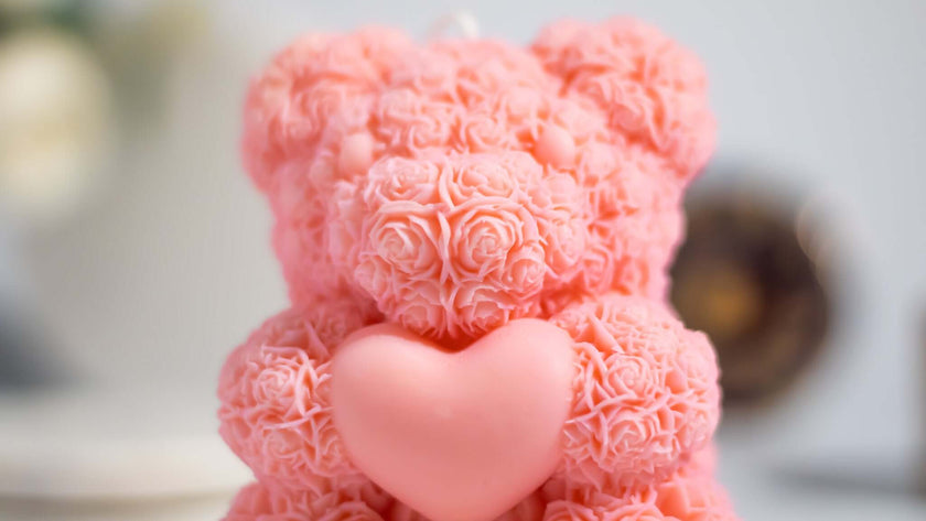Decorative Flower Bear candle displayed on a wooden surface, adding a whimsical and romantic touch to home décor.