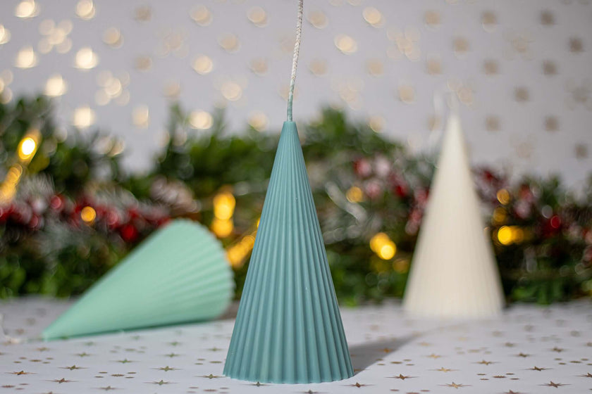 Christmas tree decorative candles in teal and white, perfect for holiday gifting and festive decor.