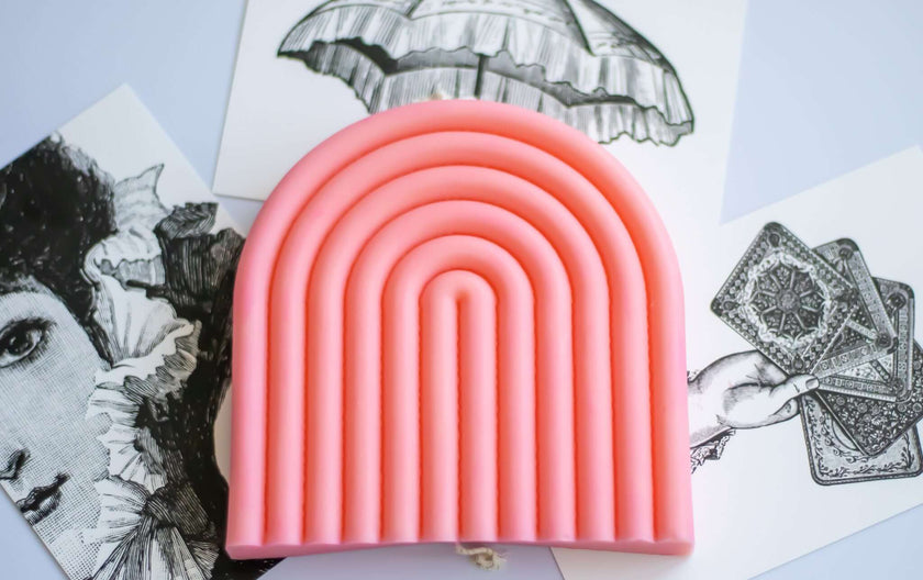 Big Arch candle displayed on a tabletop, bringing a touch of modern elegance and warm ambiance.