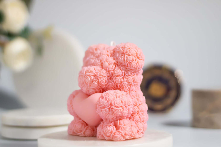 Luxury sculptural candle in the shape of a floral teddy bear, blending artistic craftsmanship with a delightful scent.