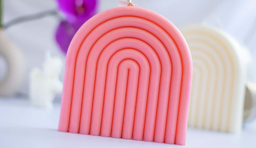 Natural soy wax scented candle with a bold architectural arch design, adding sophistication to any space.