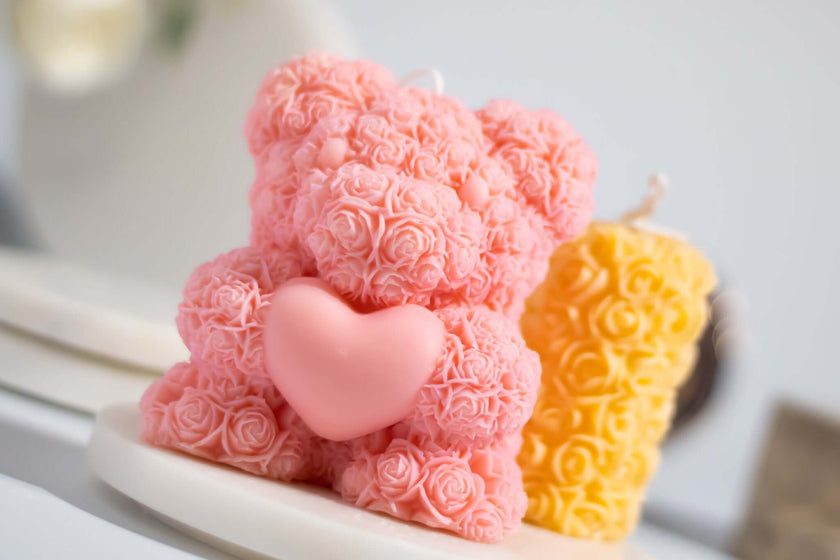 Close-up of the Flower Bear candle, showcasing its intricate rose-like texture and smooth natural wax finish.