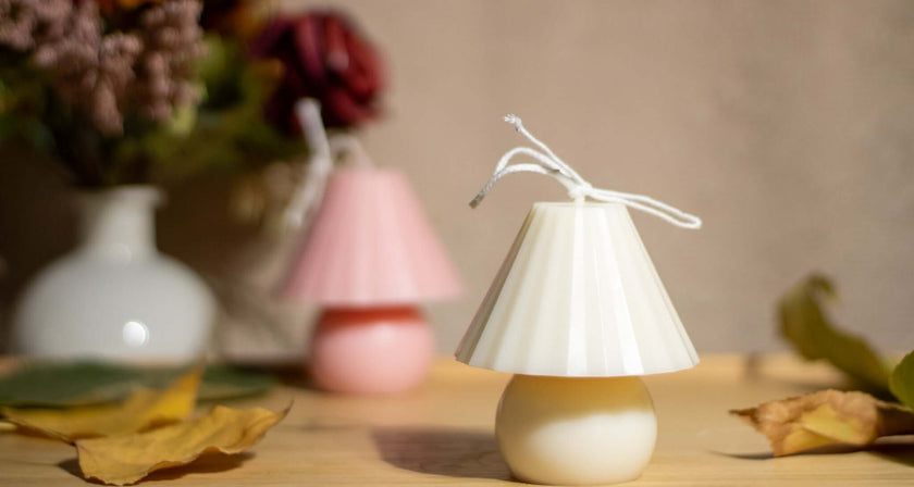 Handcrafted mushroom decorative candles in pastel colors, adding elegance and charm to home decor.