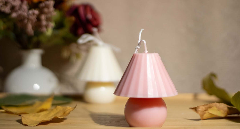 Eco-friendly sculptural candle shaped like a mystical mushroom, blending fantasy aesthetics with sustainable craftsmanship.