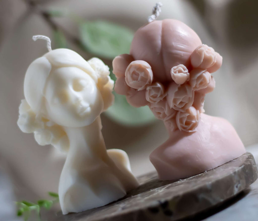 Elegant bust-shaped candle with intricately crafted roses, made from natural wax for a luxurious touch.
