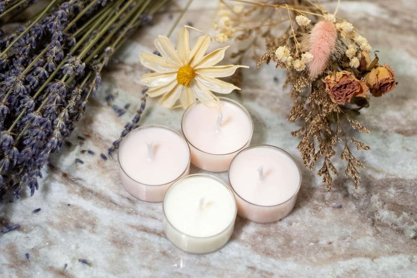 Natural soy wax tealight candles in recyclable clear cups.