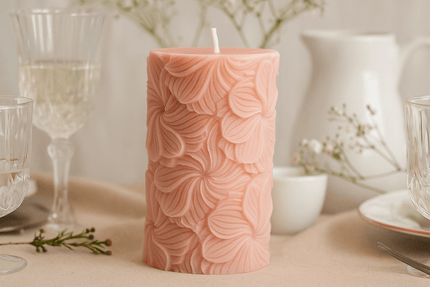 Sculptural Garden Pillar candle displayed on a tabletop, adding a romantic and nature-inspired aesthetic to any space.