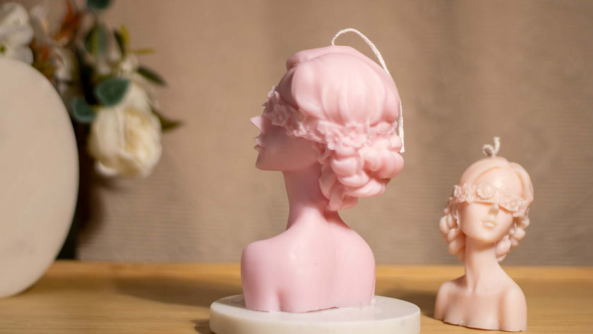 Sculptural decor candle – woman with blindfold in minimalist soft wax form.