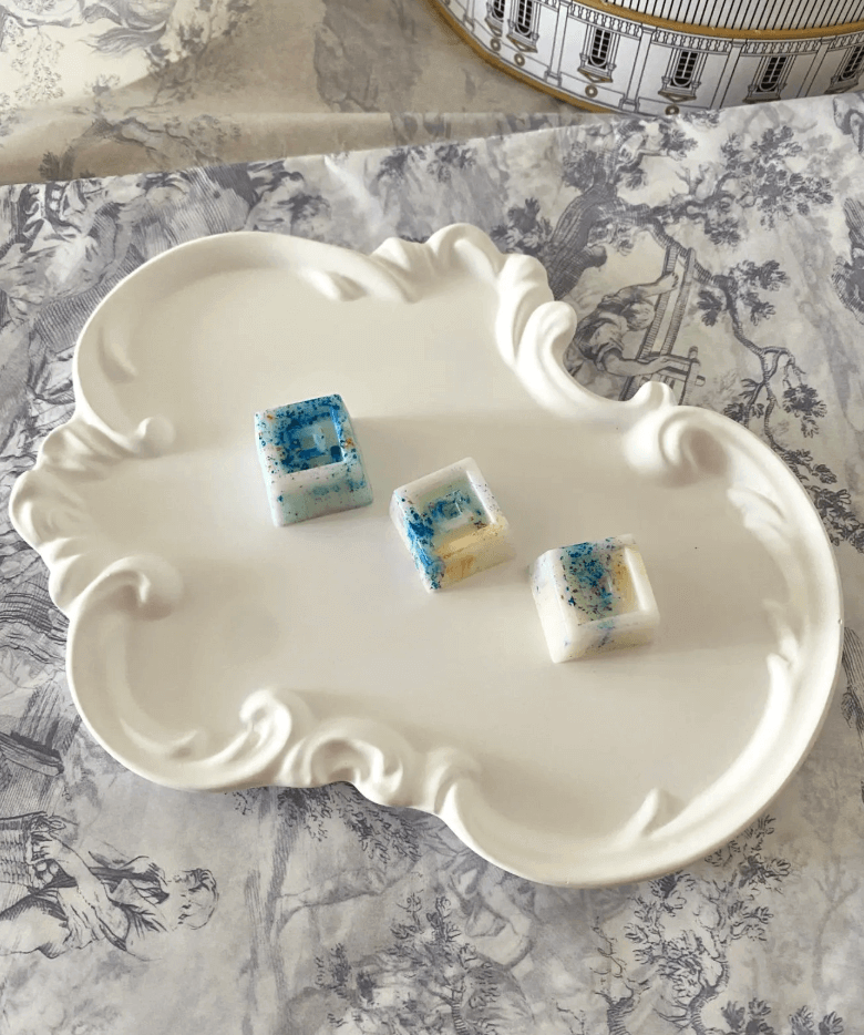 Sustainable candle holder tray styled with aromatherapy soy wax candle

