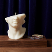 unique-half-face-david-bust-sculpture-candle-handmade-soy-wax-art-classical-greek-decor-unique-gift-sculptural-candle-for-wedding - lit candle