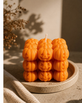 Jack O Lantern soy wax candle in orange pumpkin cube shape
