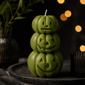 Green Jack O Lantern candle for fall shelf styling