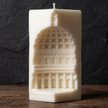capitol-architecture-column-candle-handmade-sculptural-soy-wax-pillar-elegant-architectural-decor-timeless-classical-home-accent - lit candle