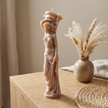 caryatid-candle-greek-inspired-soy-candle-sculpture-classical-feminine-figure-elegant-home-decor-unique-art-gift-for-her-shaped-candle - lit candle