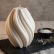 elegant-tall-swirl-candle-sculptural-design-perfect-for-any-space-stylish-home-decor-accent-ideal-gift-for-mom-and-special-occasions - lit candle
