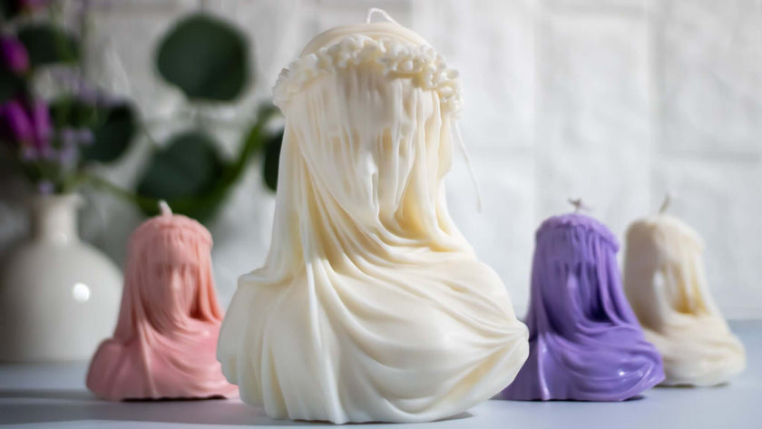 Veiled woman bust candle – luxury scented soy wax decor piece for high-end minimalist homes.