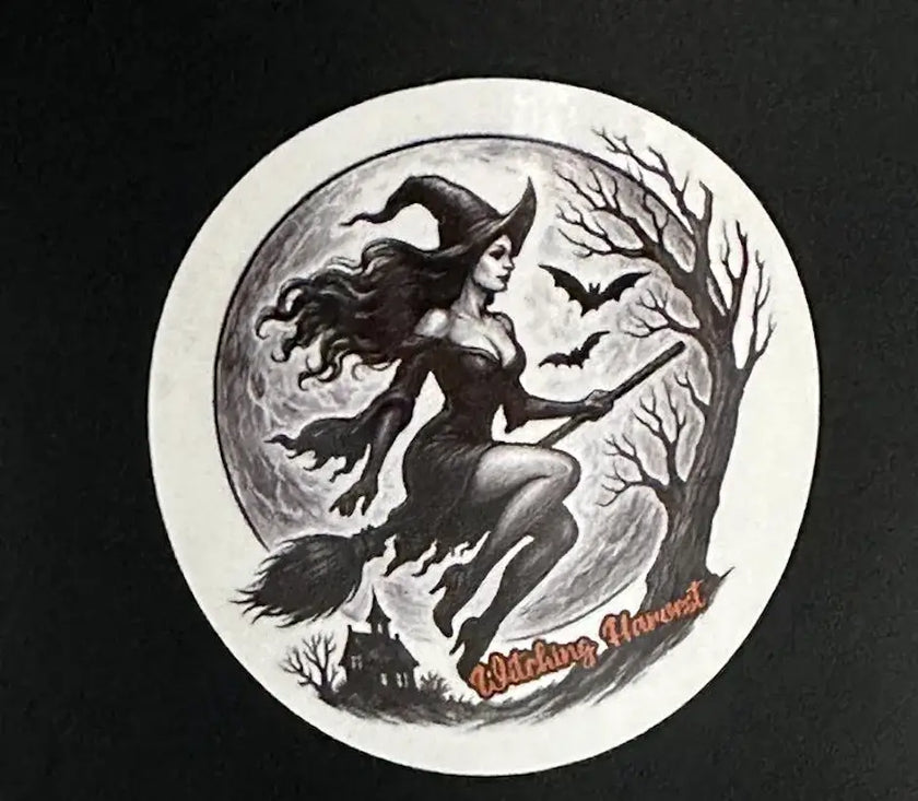 Witch-themed soy candle label – spooky flying witch over full moon with bats and bare trees