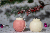 Snowflake-inspired scented candle, perfect for creating a warm and inviting ambiance during the holiday season.