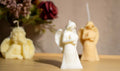 Handcrafted Angelic Love decorative candle, featuring an elegant angel figure holding a heart, made from natural wax.