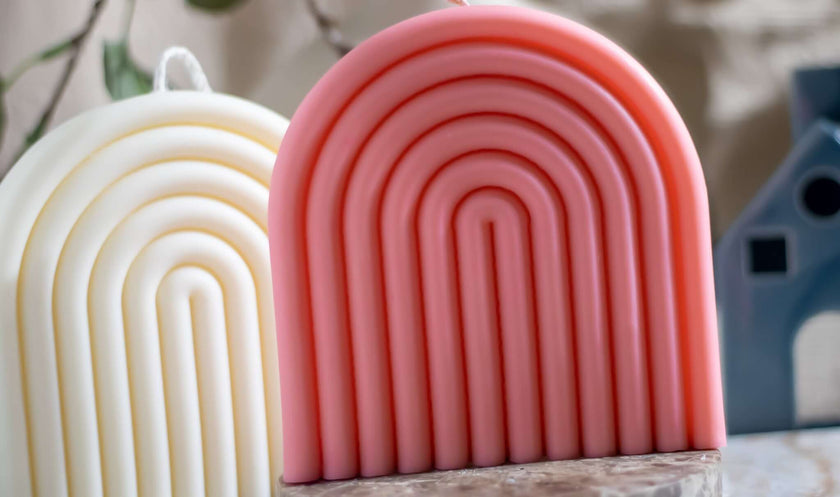 Contemporary sculptural candle with a clean, arched form, perfect for stylish home décor and relaxation.